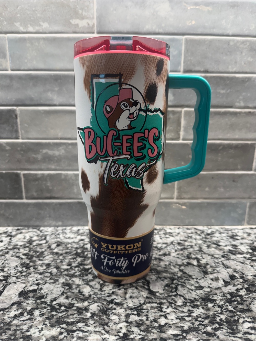 Buc-ee’s Texas Cowhide 40 oz Yukon Outfitters Tumbler with Handle